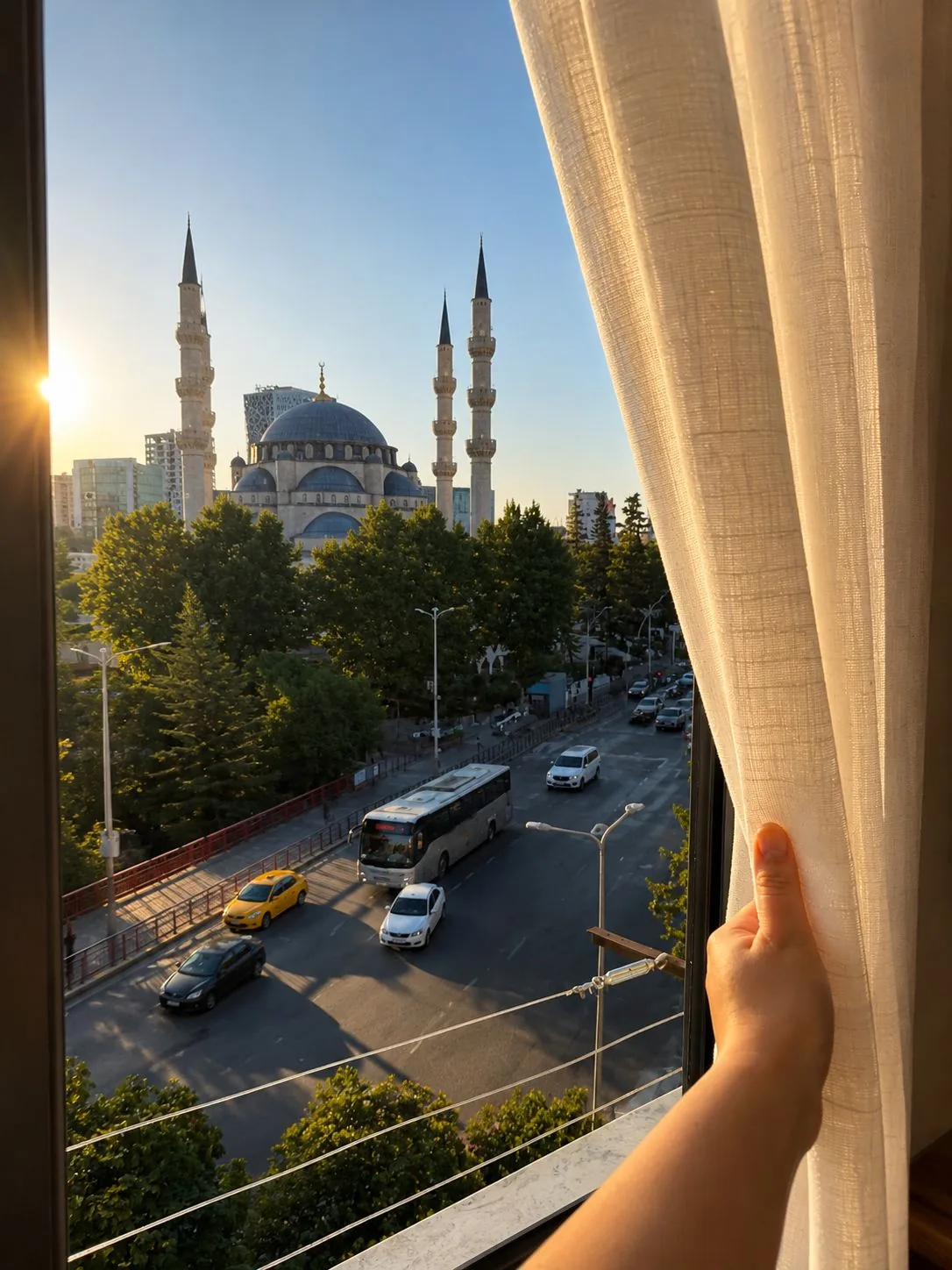 Morning view from the apartment window over the Namazgah Grand Mosque and central Tirana