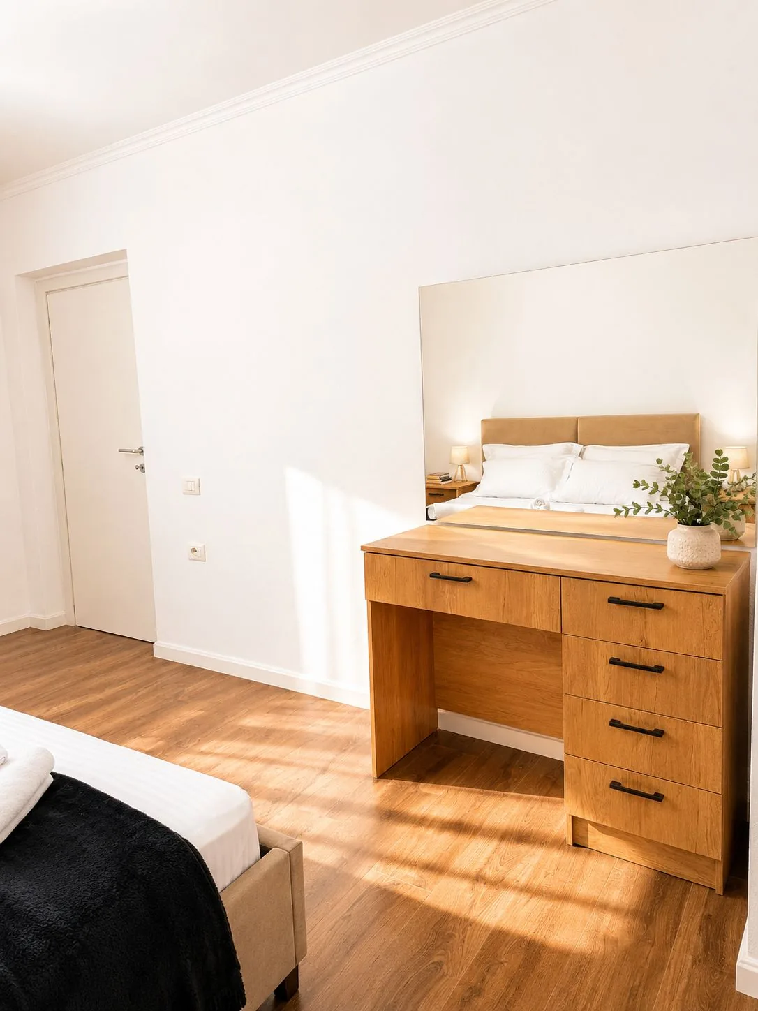Bedroom desk with drawers, large mirror and natural light